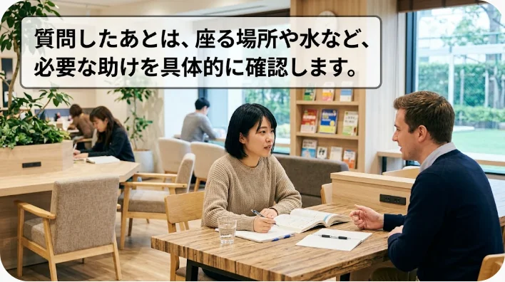 体調の悪そうな同僚に椅子と水を勧める日本人の英語学習者
